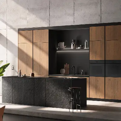 Modern kitchen with wooden cabinetry, black island, and minimalist decor.